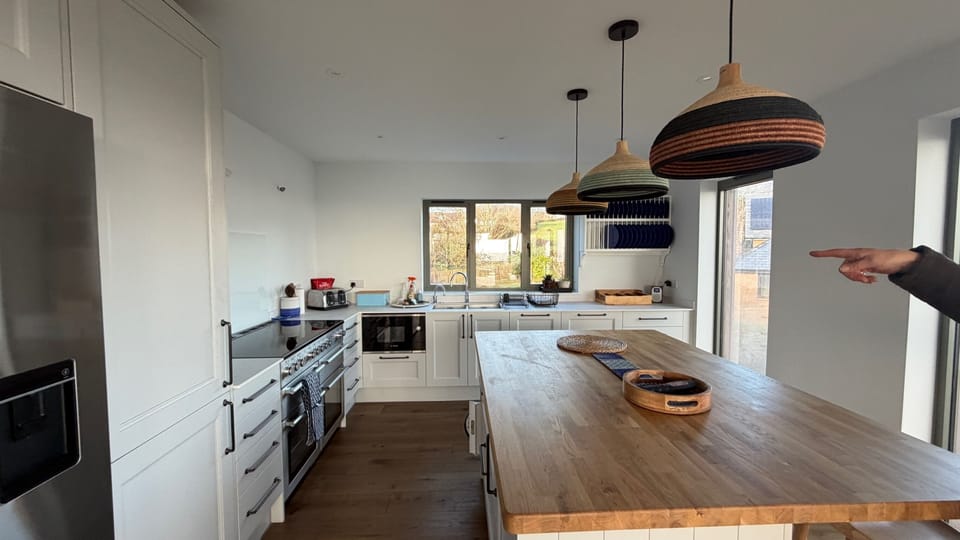 Open plan kitchen and hard wood island