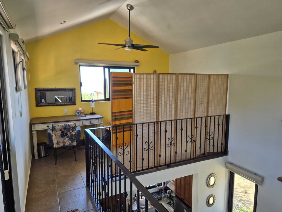 Upstairs loft configured as a second bedroom. with privacy partition in place.
