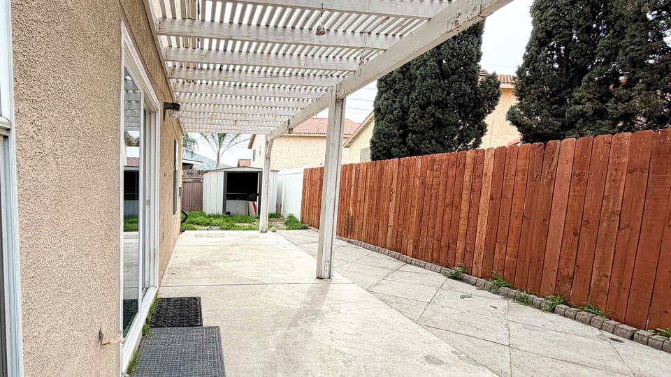 Private backyard space perfect for relaxing and enjoying fresh air outdoors.
