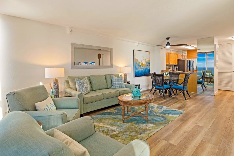 Bright and spacious living room with a comfortable sleeper sofa—perfect for extra sleeping arrangements