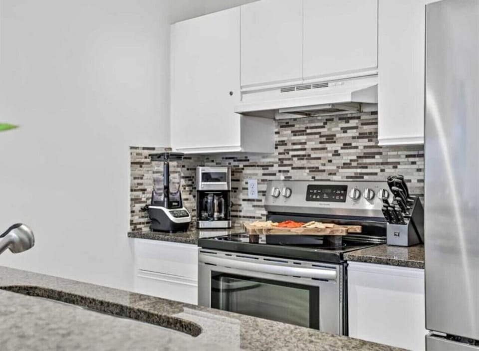 Enjoy hassle-free meal preparation in the fully-equipped kitchen furnished with modern appliances.