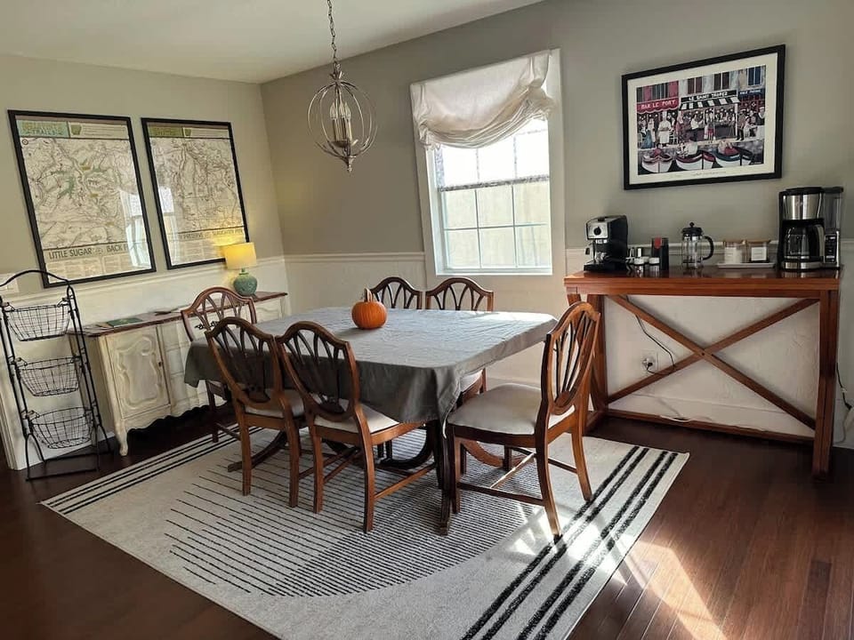 Six person dining table (a family antique). Coffee bar. And two large bike maps - one for Bentonville and the other for Bella Vista trails!