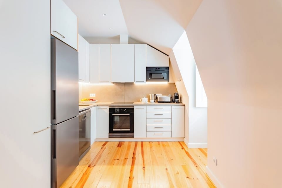 Fully Equipped Kitchen with dishwasher and washing machine.