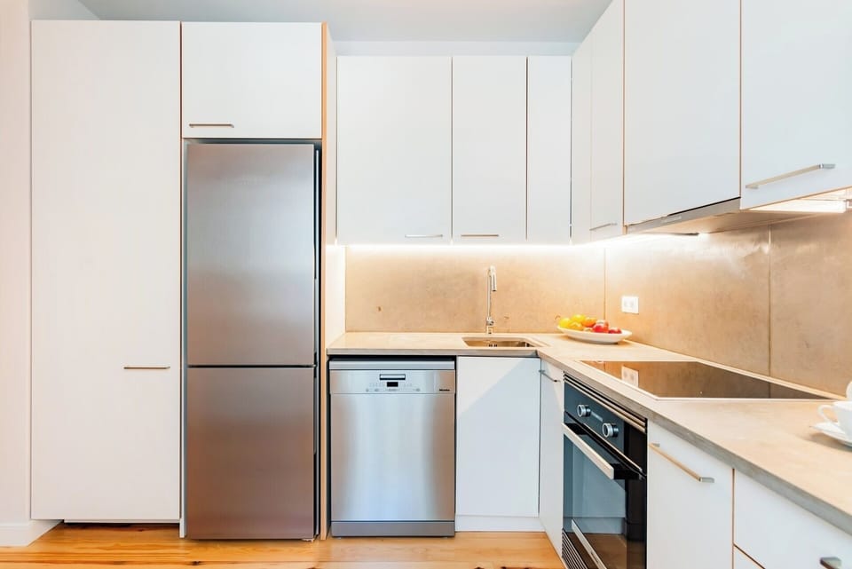 Fully Equipped Kitchen with dishwasher and washing machine.