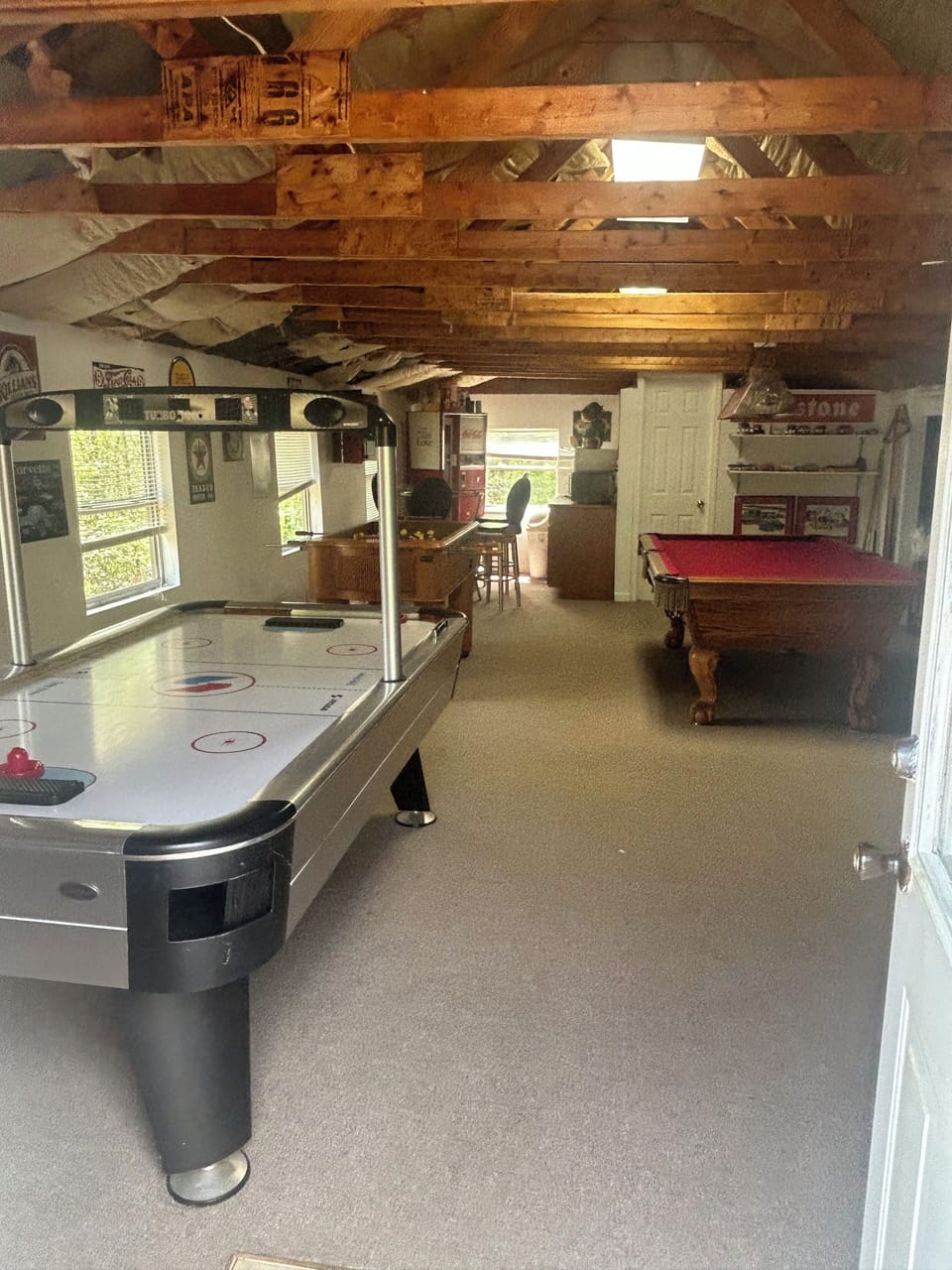 Game room above the garage climate controlled. There is a queen bed.