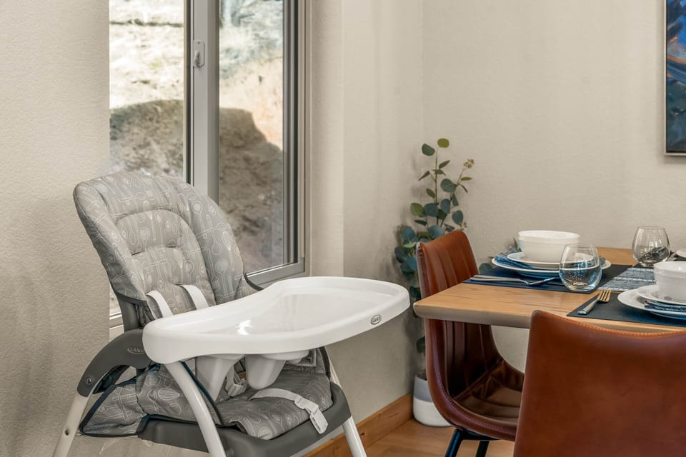 A high chair is provided for easier travel with little ones.