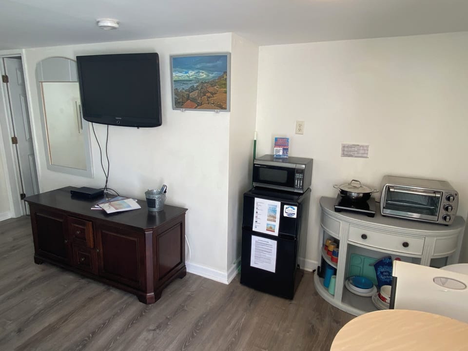Your suite offers entertainment and convenience with flat-screen TV, microwave, toaster oven, and mini-fridge for comfortable extended stays.