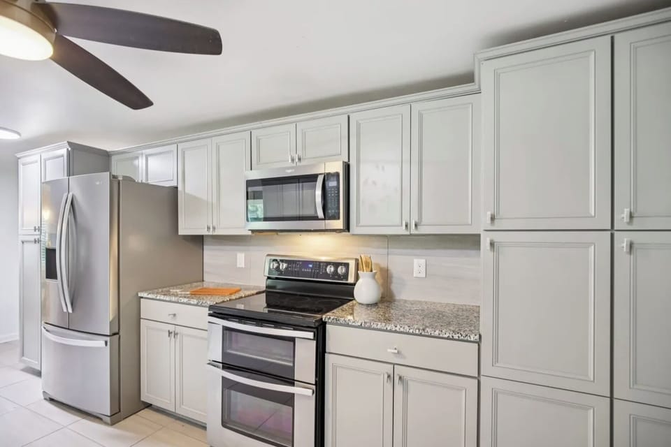 Kitchen with double oven and microwave