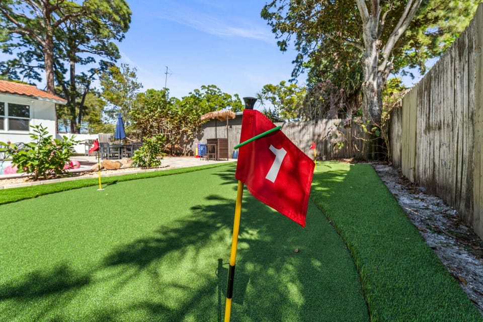 Our private backyard features an artificial turf putting green, perfect for practicing your short game during your stay.