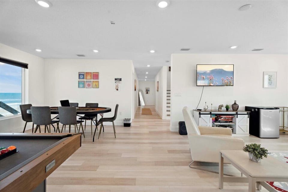 Coastal living area with stunning views and entertainment space.