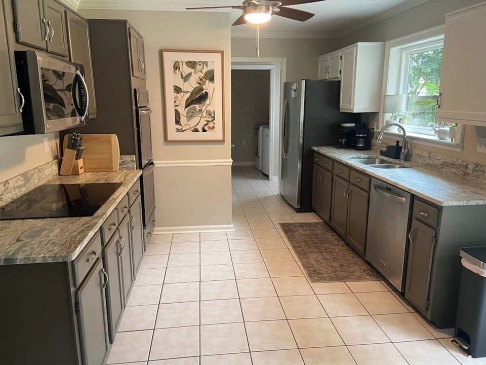 Bake a homemade cherry pie, or a heat up a frozen pizza.  You can do either, in this well-stocked kitchen.