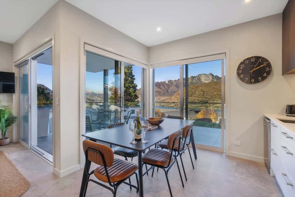 Lake and mountain views from the open plan kitchen and dining room.