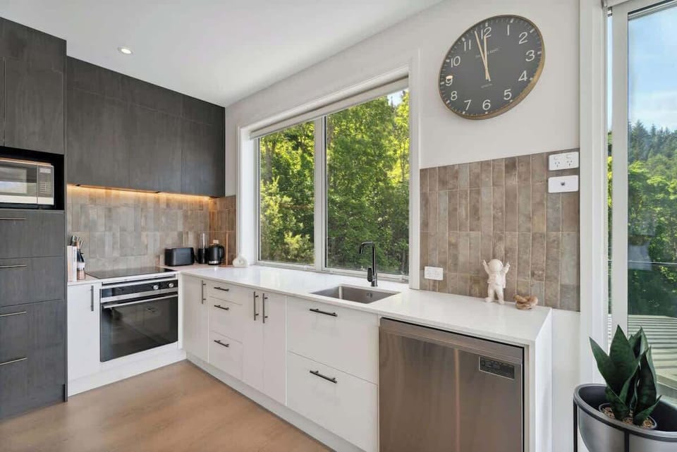 Beautiful modern kitchen with fantastic views of the mountains and lake.