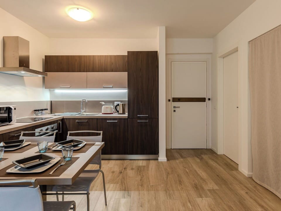 Interior Design, Kitchen, Flooring, Wood, Furniture, Ceiling, Kitchen Appliance, Countertop, Floor, Cabinetry