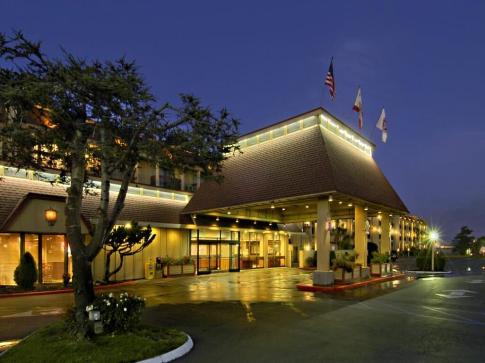 Enjoy a quiet evening arrival with glowing exterior lights.
