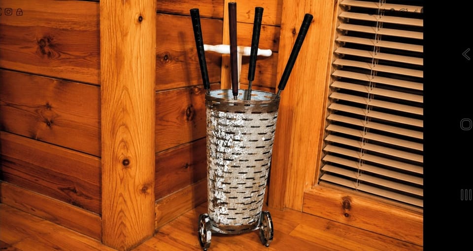 interior, indoor, closeup, mini golf sticks. 