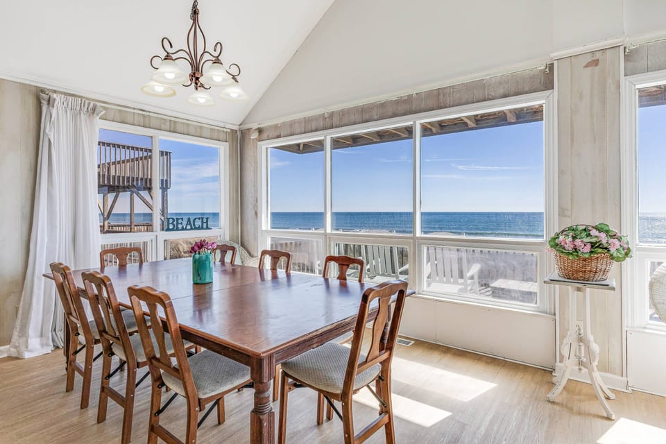 Dining table with seating for 8 with ocean views