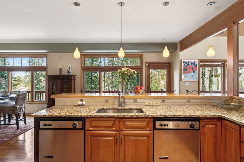 Straight-on view of the kitchen sink and prep area.