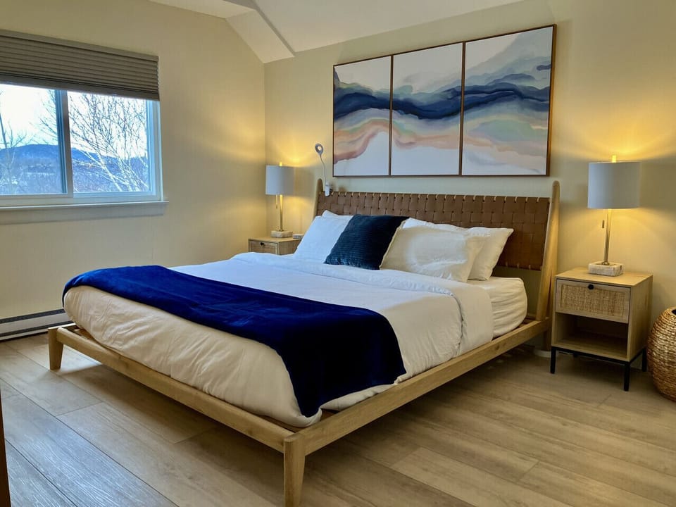 Relax in style: King bed with natural light.