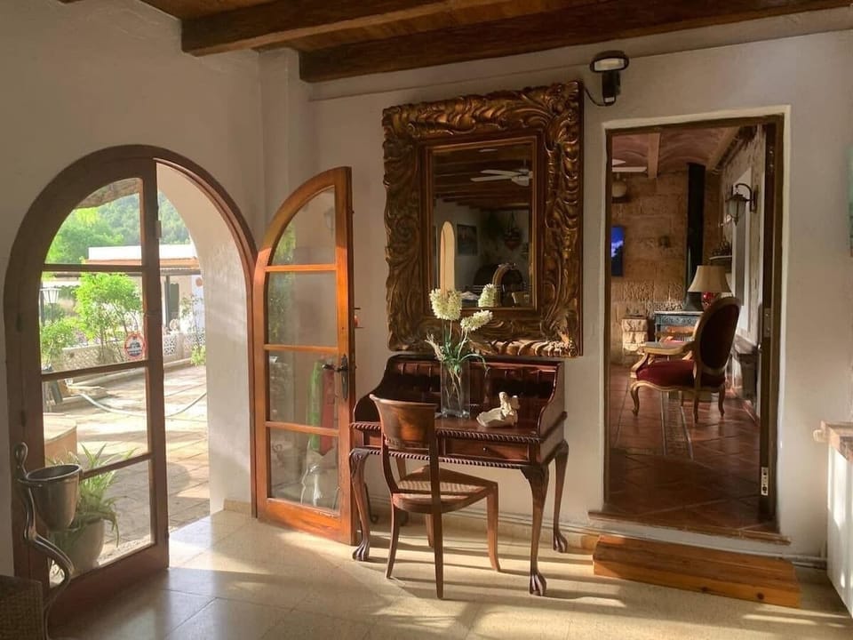 Reception area from the main lounge to the smaller lounge & access to the garden