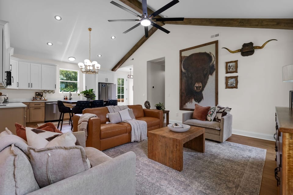 ( House 2) The spacious living room, featuring a Large TV and plenty of seating