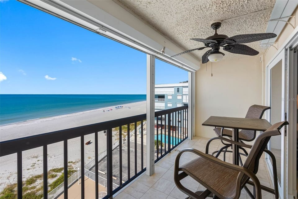 Balcony of unit 503 with unobstructed beach and sunset view