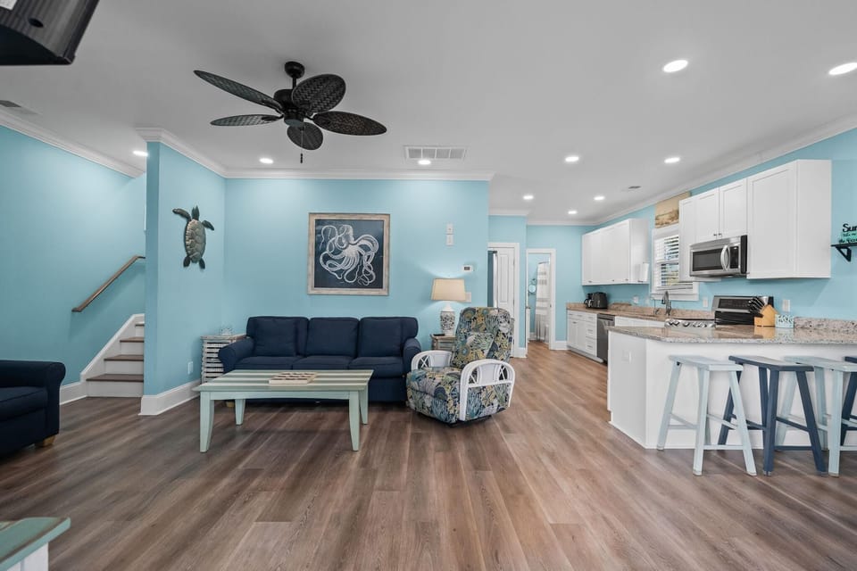 Spacious living room with coastal charm and modern comfort