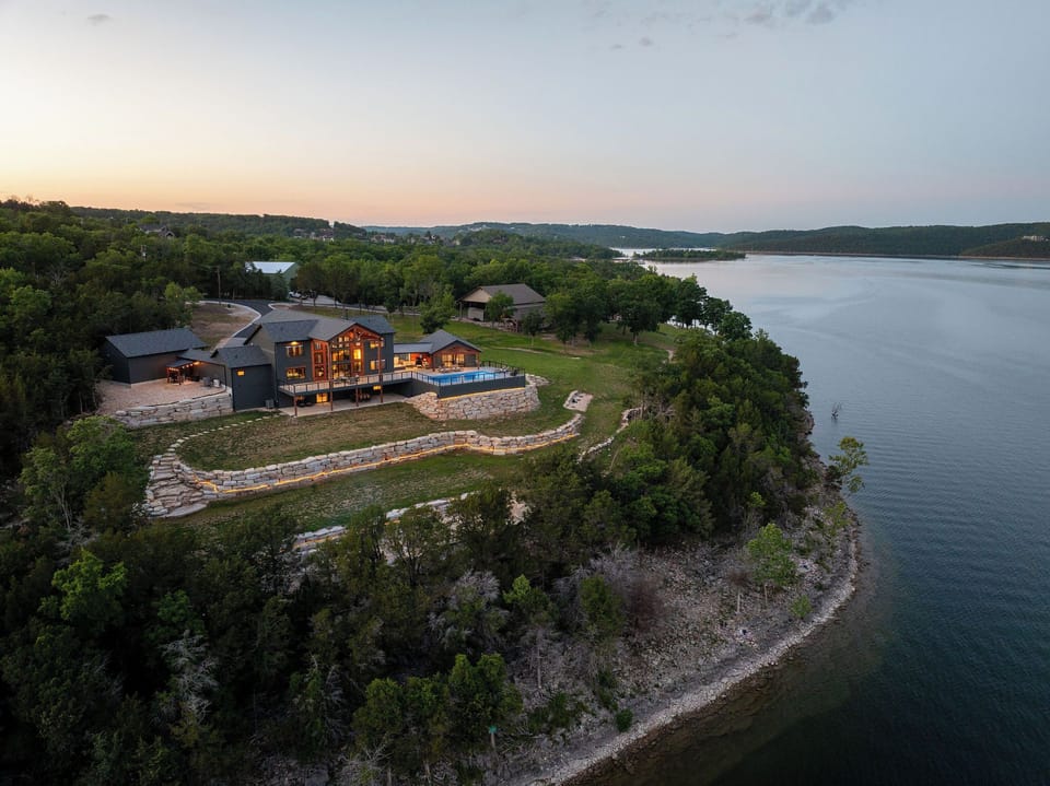 Nestled along the shoreline, this one-of-a-kind retreat offers a rare combination of privacy, comfort, and unforgettable views.