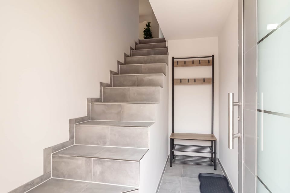 Stairs from the private entrance to the apartment