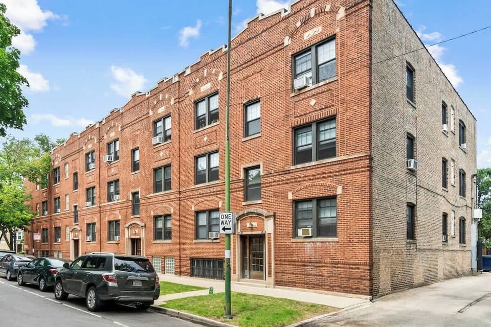 For all those who are curious, its a pretty standard old apartment building (by Chicago standards).  Your windows are at sidewalk level.