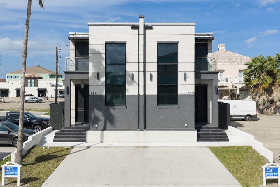 Welcome to 102B E. Whiting (right side only) a modern coastal retreat located in the heart of South Padre Island.