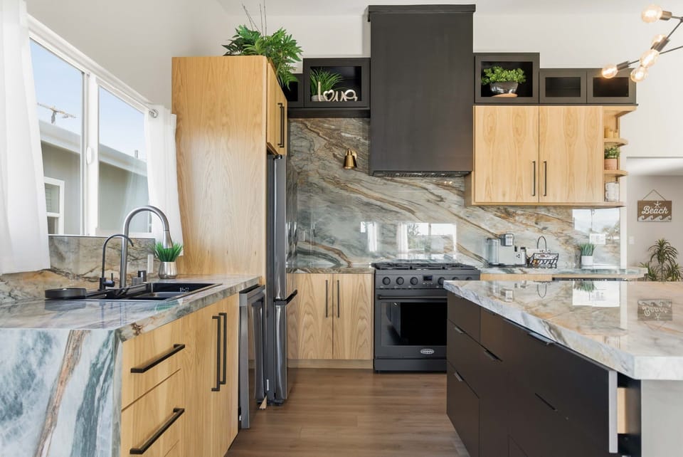 Gorgeous custom kitchen with huge island and tons of storage.