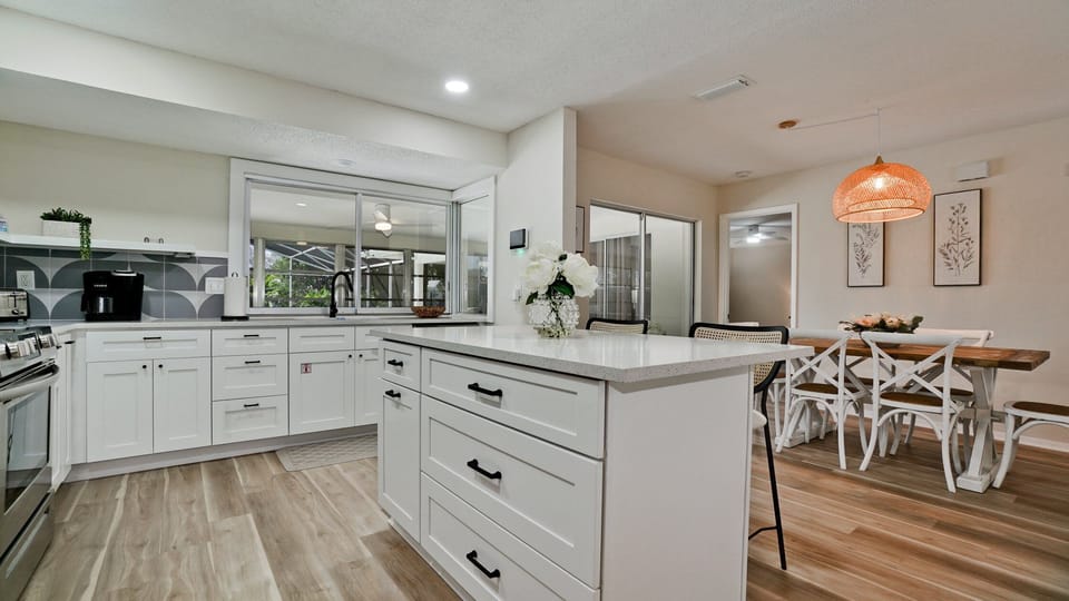 Fully equipped kitchen with island and complementary coffee bar