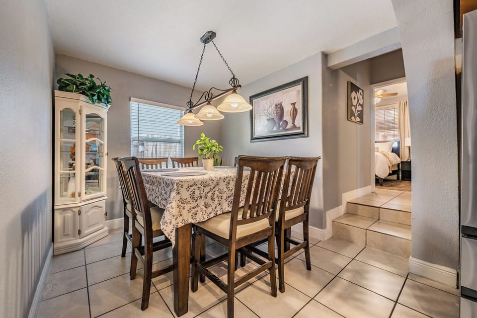 Gather around the stylish dining area, comfortably seating 6, great for family meals, entertaining friends, or enjoying morning coffee together in a bright, welcoming space.