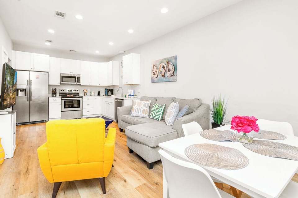 Your bright open-plan retreat combines modern comfort with vibrant style. Relax in the cozy living area or whip up meals in your fully-equipped kitchen.