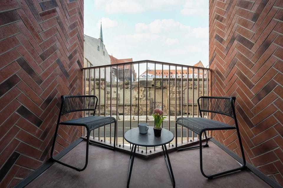 The balcony provides a perfect spot for enjoying the fresh air.