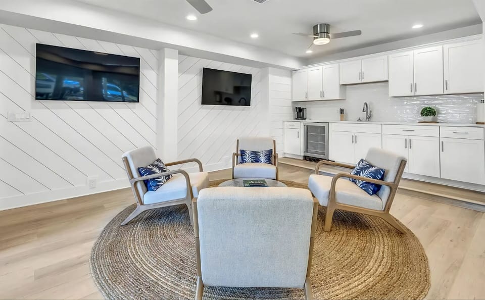 A serene first-floor lounge complemented by a discreet, well-designed kitchenette.