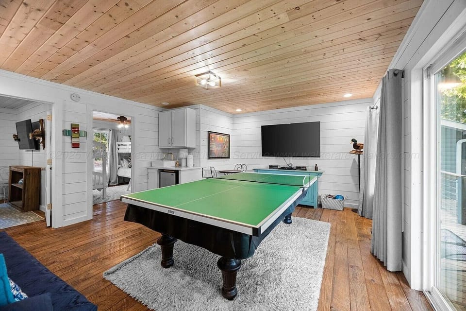Guest house living space with ping pong & pool table 