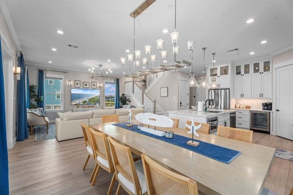 Open dining and kitchen layout ideal for entertaining large groups.