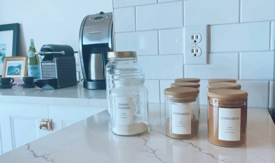 The pantry houses a selection of fresh, organic herbs and spices for your use