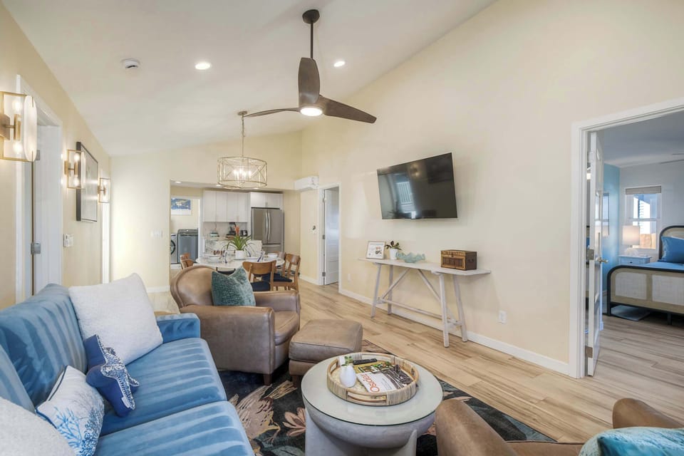 Cozy open living with queen sleeper sofa and smart TV