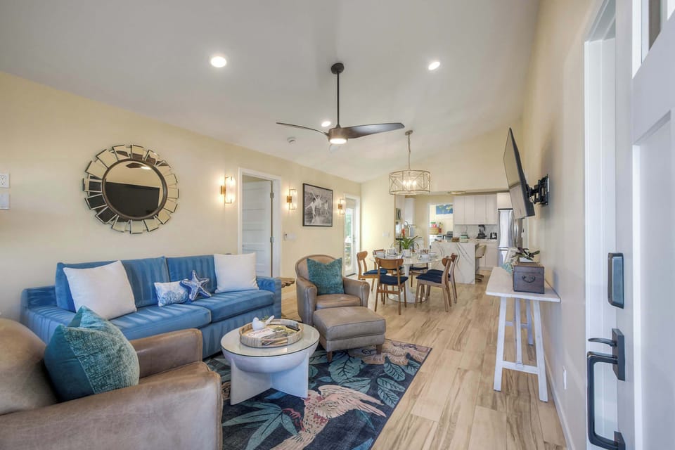 Cozy open living with queen sleeper sofa and smart TV