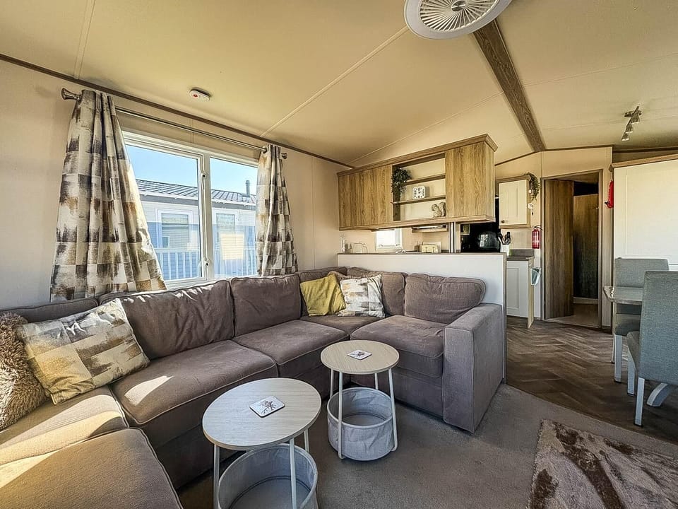The spacious living area is perfect for catching up with family after a busy day.