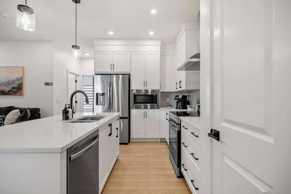 Modern Kitchen with Large Island & Stainless Appliances