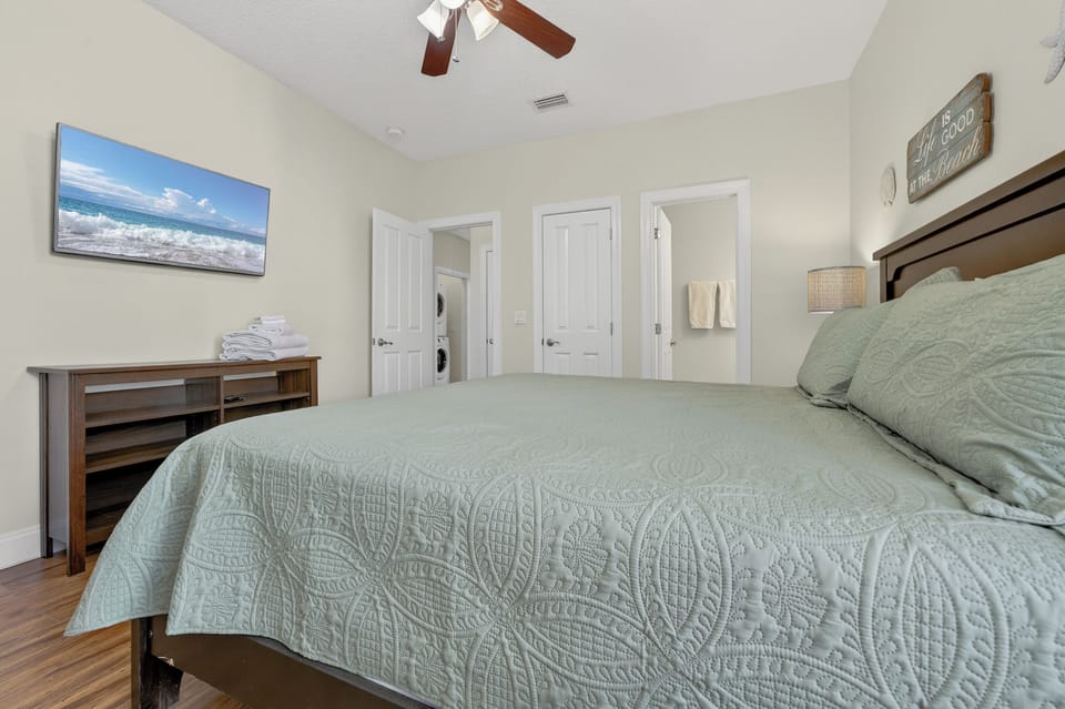 Bedroom 4. King Bed. Upstairs hallway in distance. Private en suite included.