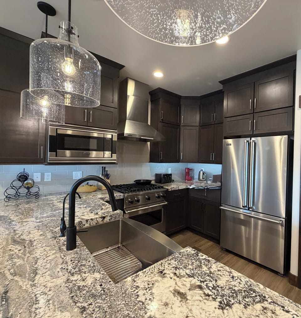Chef's kitchen with viking appliances, well equipped and stocked.