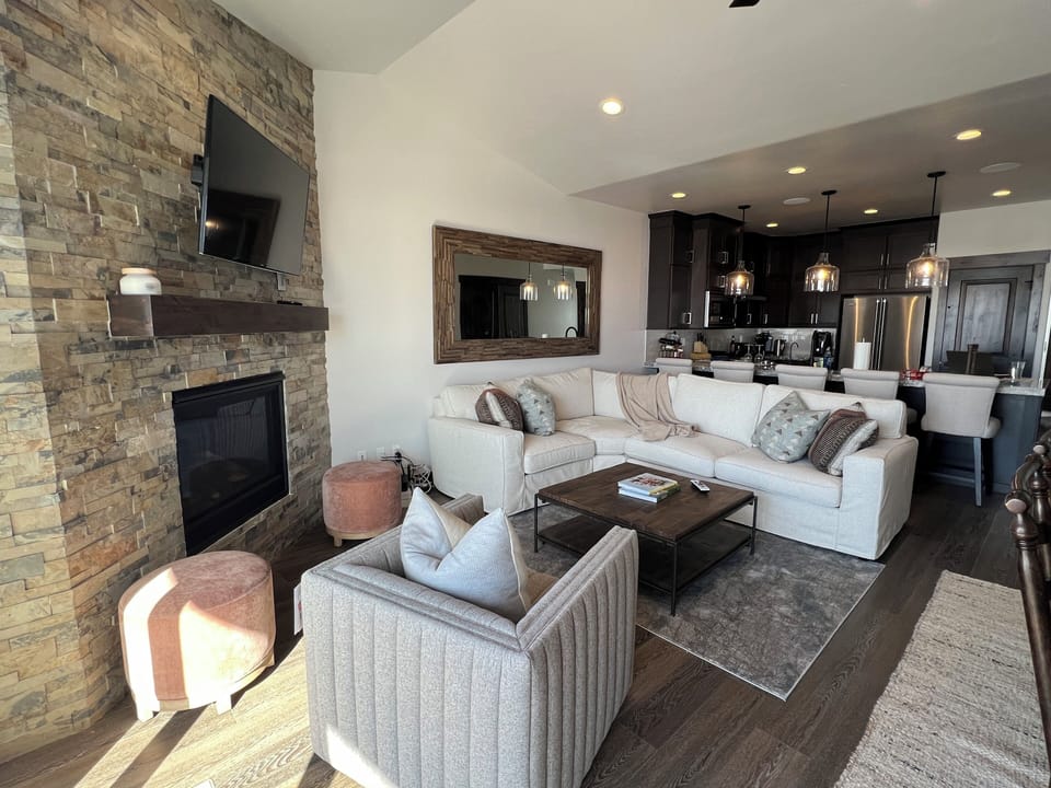 Living room with gas fireplace, TV, comfortable seating