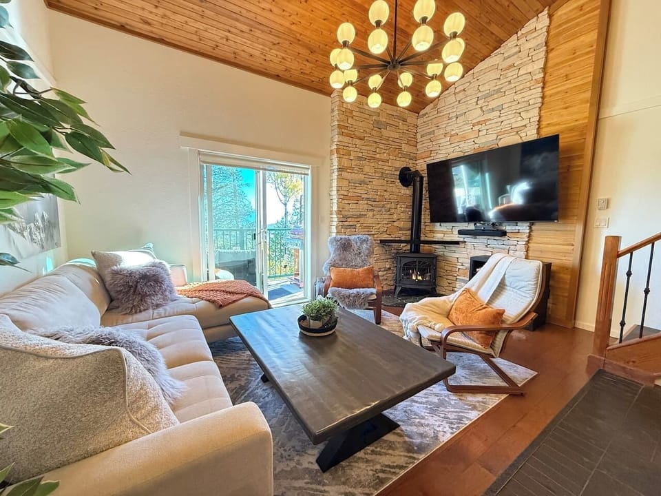 Gas fireplace, 78” TV & deep-seat comfort—I believe in cozy mountain living.
