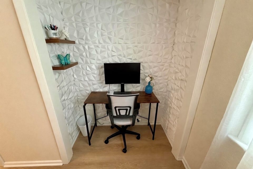 Quiet workspace in master bedroom