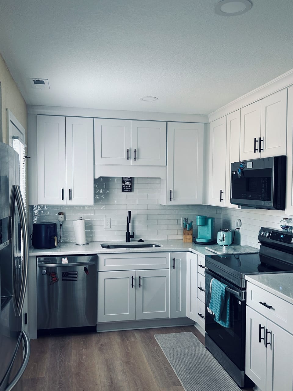 Modern white kitchen, new appliances, Keurig